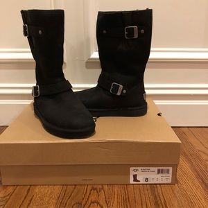 Black buckled UGG boots